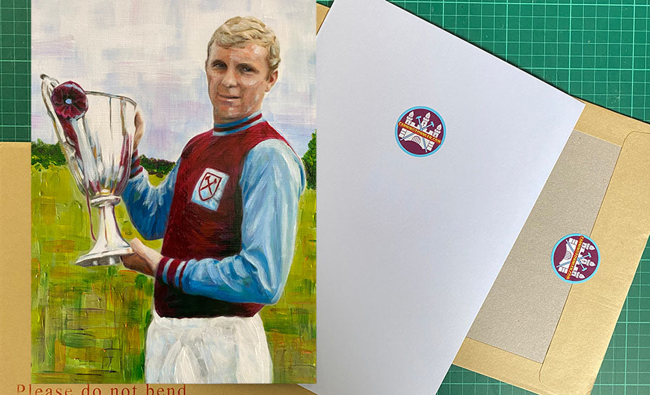 Bobby Moore with ECWC trophy!